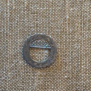 Silver round pin brooch